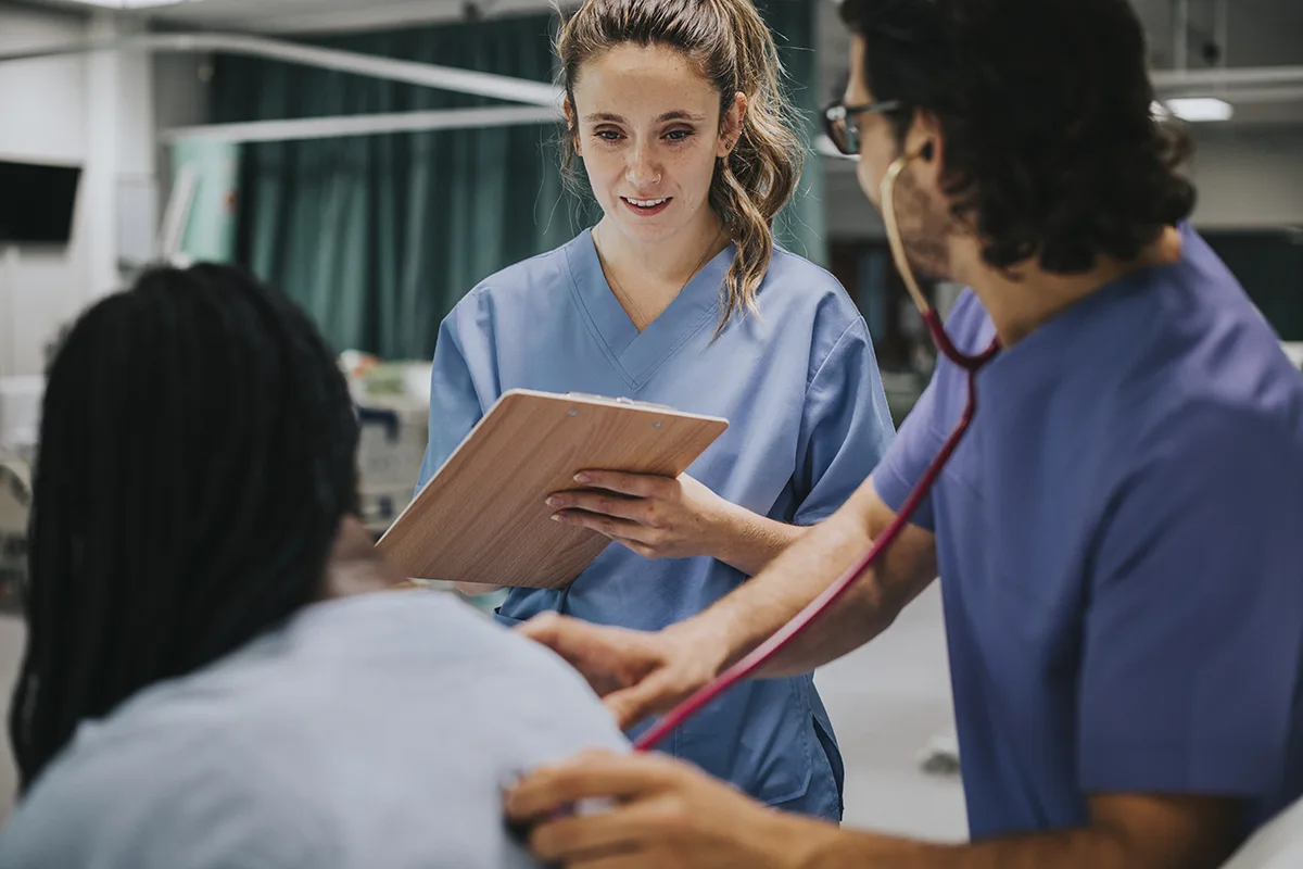 Image of a nurse treating a patient